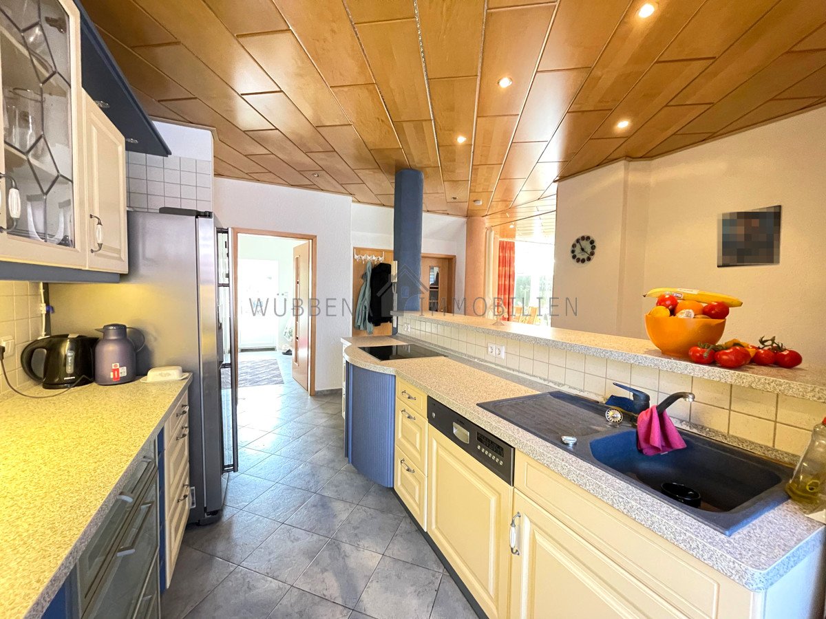 Einfamilienhaus in Emden mit Wintergarten, Einliegerwohnung, Balkon & pflegeleichtem Garten