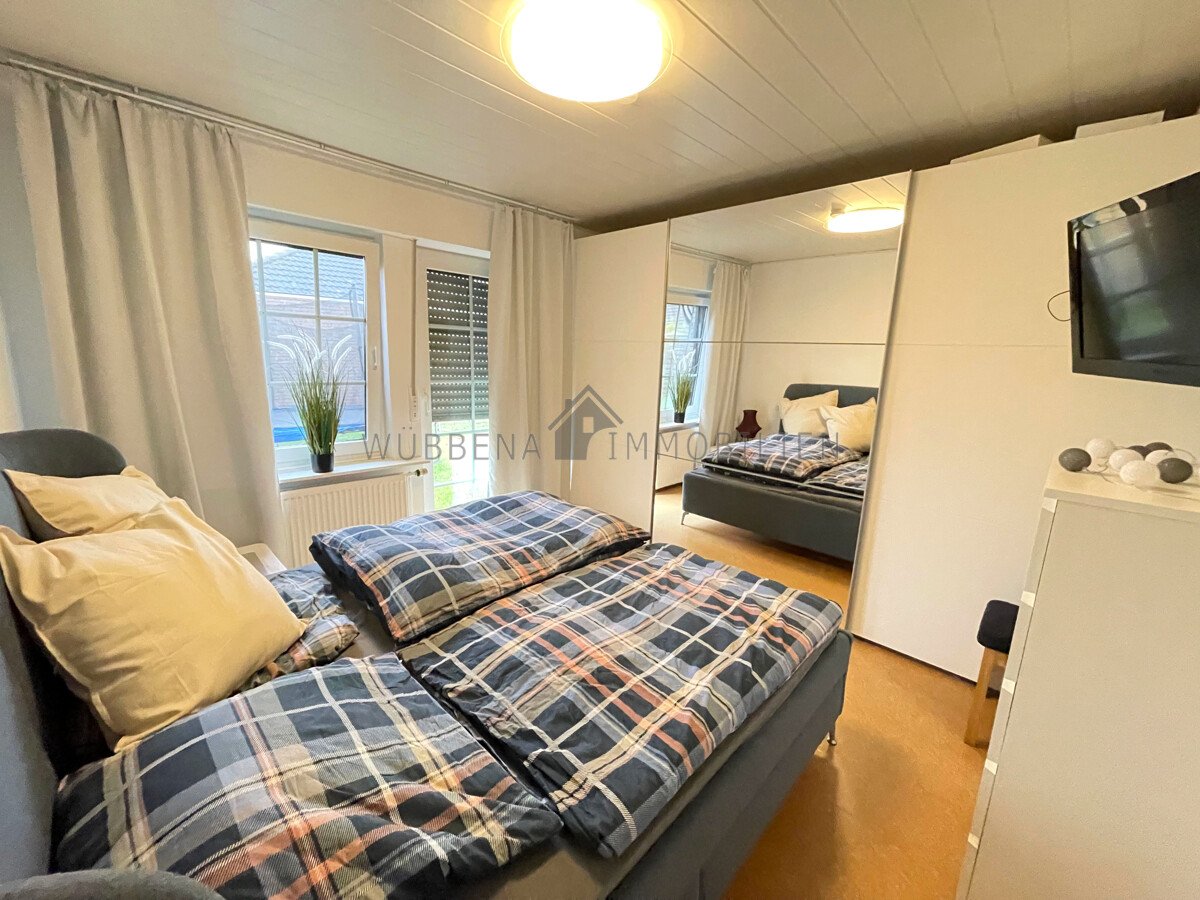 Hinte-Suurhusen – Wohnen auf einer Ebene! Gepflegter Bungalow mit Garten, Kamin und Garage