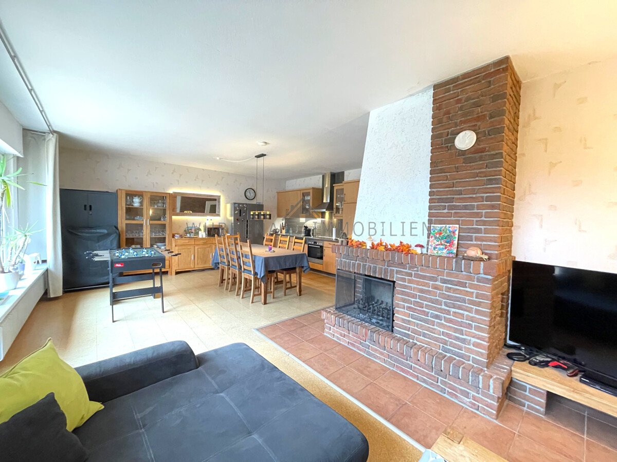 KÄUFER GEFUNDEN Suurhusen – Wohnen auf einer Ebene! Gepflegter Bungalow mit Garten, Kamin und Garage