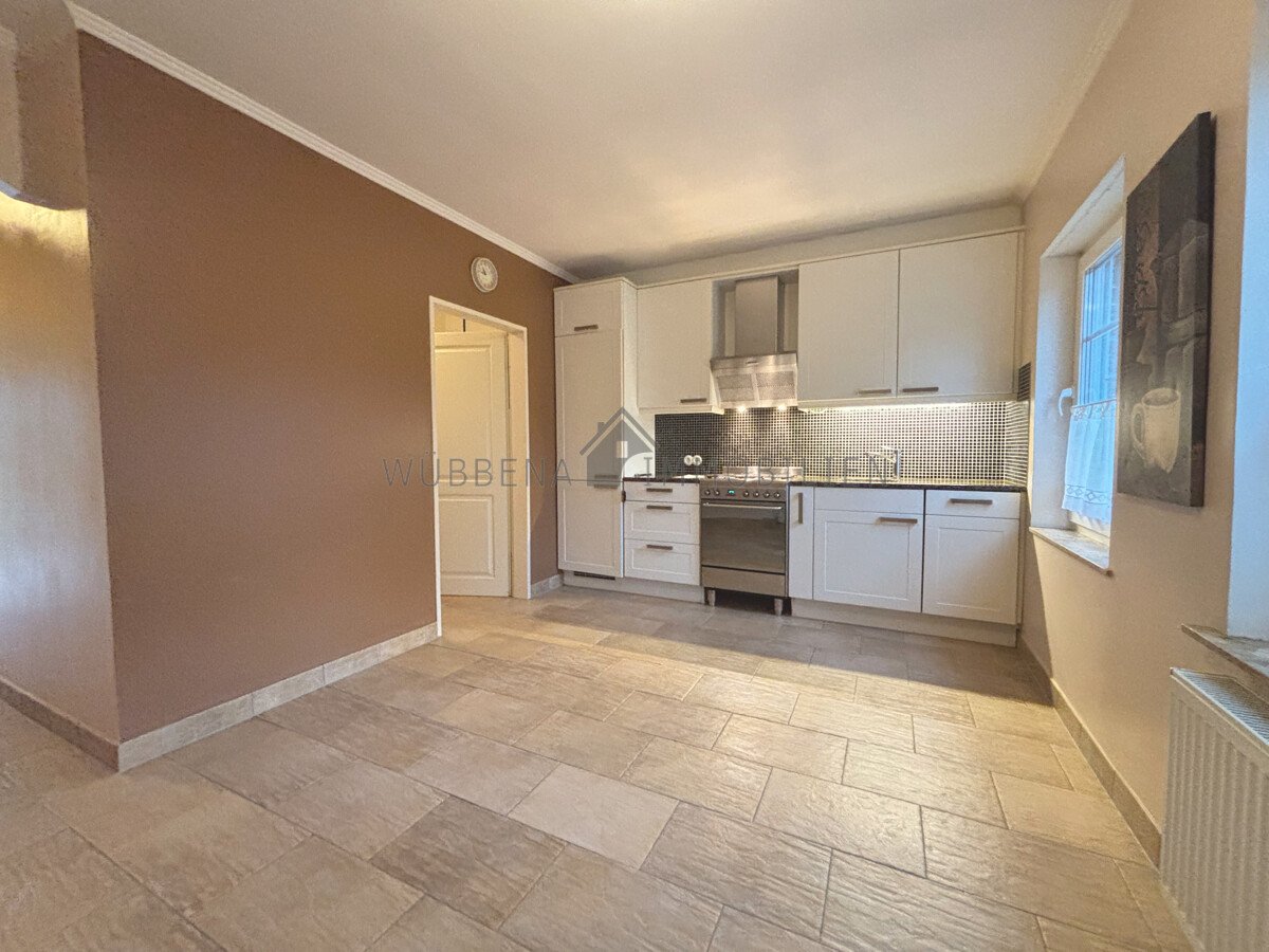 Modernisiertes Reihenmittelhaus mit Südterrasse, Garten und Bootssteg in Emden zu verkaufen!