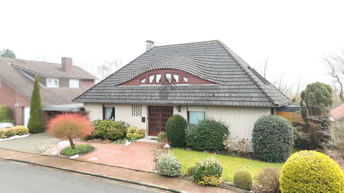 VERKAUFT! Ausgebauter Bungalow mit Wintergarten und Bootssteg in Kanallage von Osterhusen