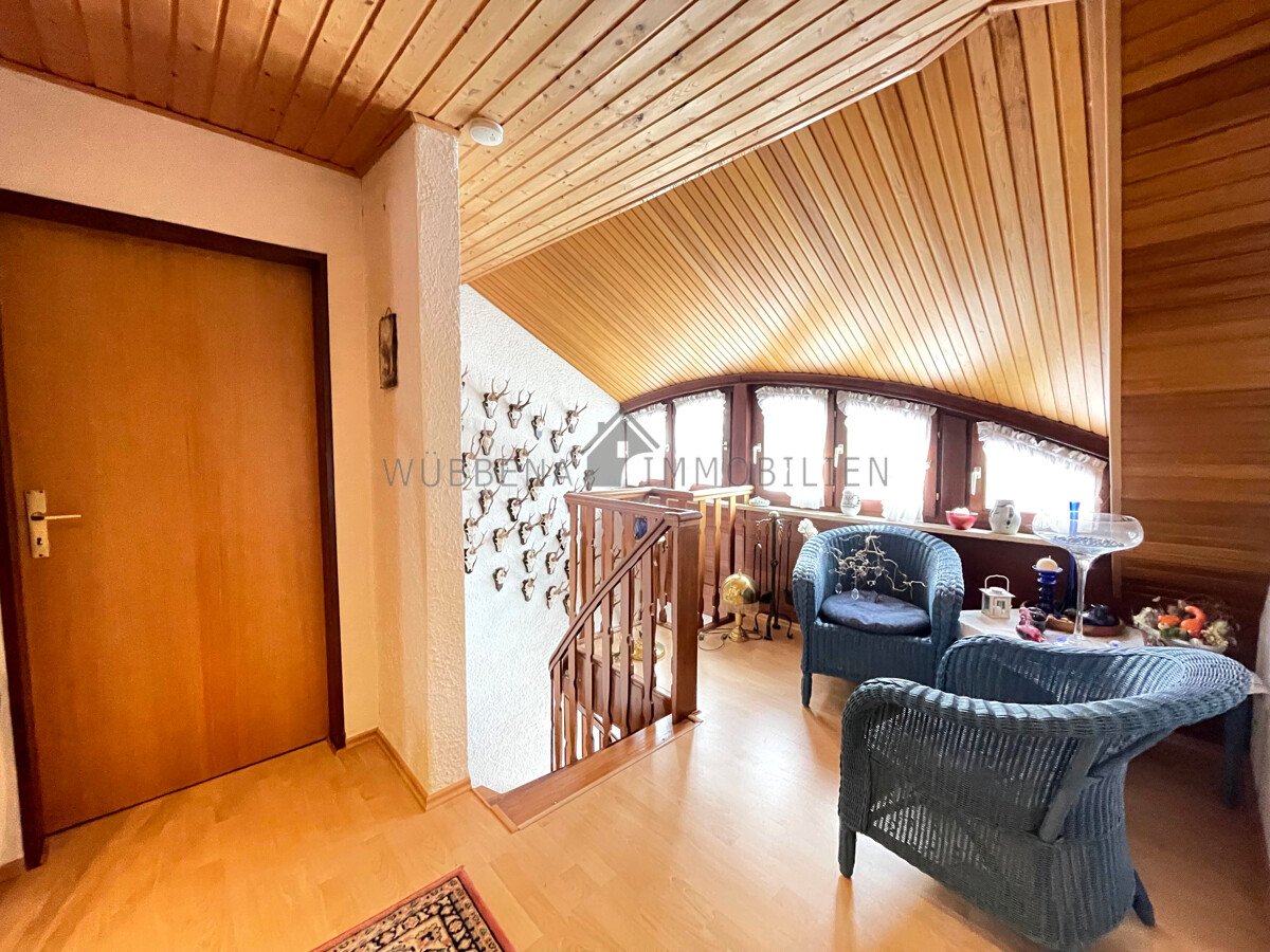 VERKAUFT! Ausgebauter Bungalow mit Wintergarten und Bootssteg in Kanallage von Osterhusen