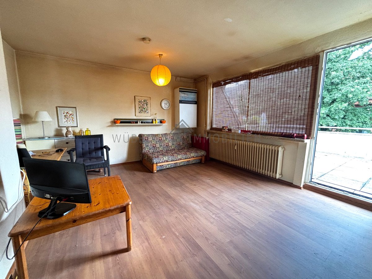 WHg. DG links - Wohnzimmer mit Zugang Dachterrasse